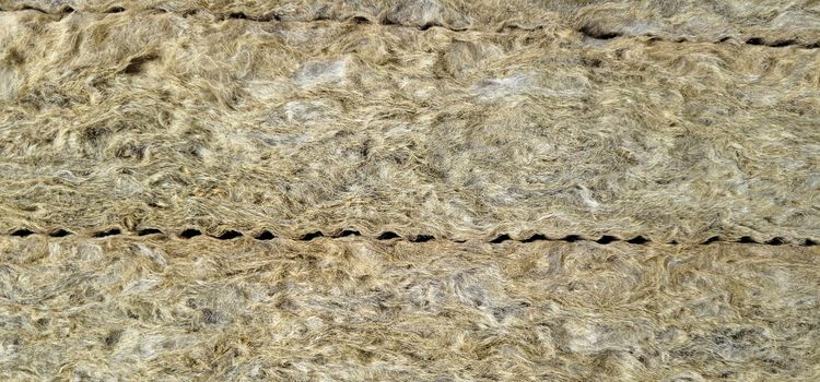 Rockwool hőszigetelés táblás kőzetgyapot kiszerelésben Rockwool hőszigetelés táblás kőzetgyapot elemek egymásra rakva raktárban